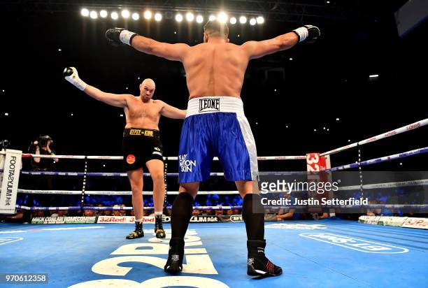 Tyson Fury and Sefer Seferi taunt each other during there heavyweight contest at Manchester Arena on June 9, 2018 in Manchester, England.