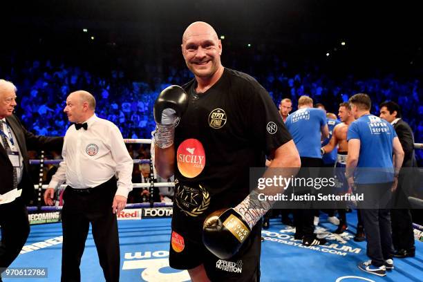 Tyson Fury celebrates victory over Sefer Seferi after there heavyweight contest at Manchester Arena on June 9, 2018 in Manchester, England.