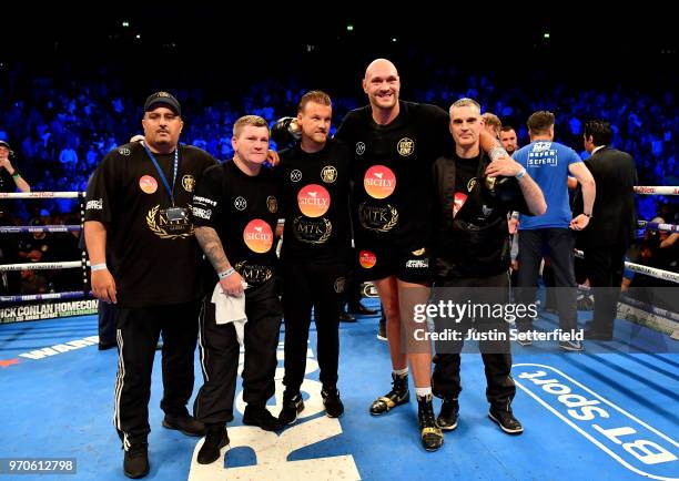 Tyson Fury and his team celebrate victory over Sefer Seferi after there heavyweight contest at Manchester Arena on June 9, 2018 in Manchester,...