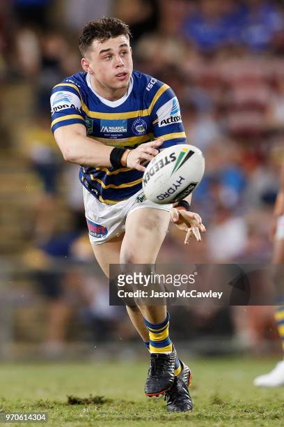 Reed Mahoney of the Eels passes the ball during the round 14 NRL match between the Parramatta Eels and the North Queensland Cowboys at TIO Stadium on...