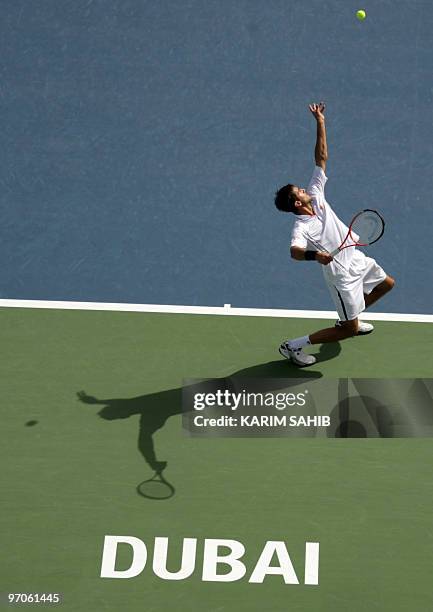 Marin Cilic of Croatia serves to Austria's Jurgen Melzer during their quarter-final match on the fourth day of the two-million-dollar ATP Dubai Open...