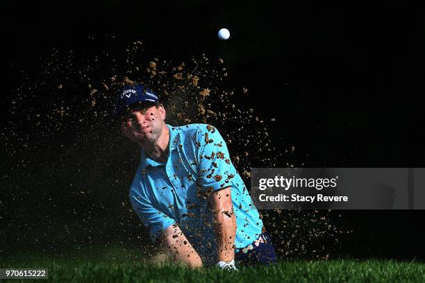 Chase Wright hits from a green side bunker on the 15th hole during the third round of the Rust-Oleum Championship at the Ivanhoe Club on June 9, 2018...