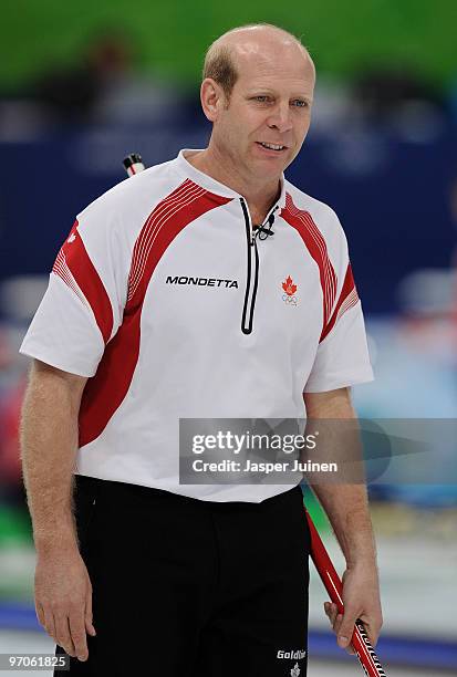 Skip Kevin Martin of Canada smiles during the men's curling semifinal game between Canada and Sweden on day 14 of the Vancouver 2010 Winter Olympics...