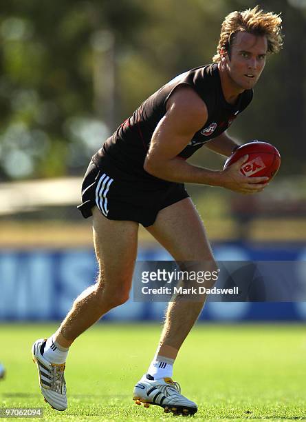 Andrew Welsh of the Bombers gathers the ball during an Essendon Bombers AFL training session at Windy Hill on February 26, 2010 in Melbourne,...