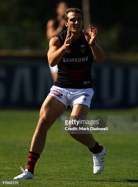 Jobe Watson of the Bombers waits for the flight of the ball during an Essendon Bombers AFL training session at Windy Hill on February 26, 2010 in...