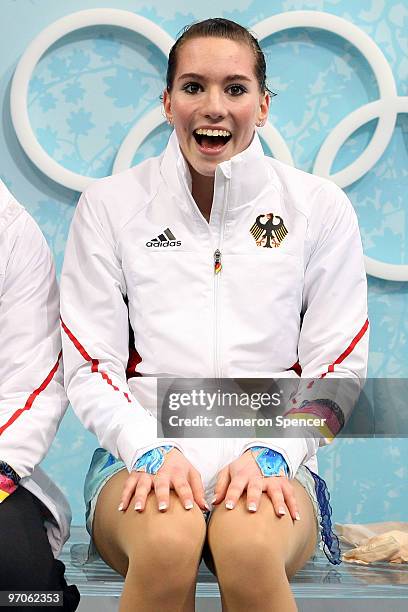 Sarah Hecken of Germany sits in the kiss and cry area after her skate in the Ladies Free Skating on day 14 of the 2010 Vancouver Winter Olympics at...