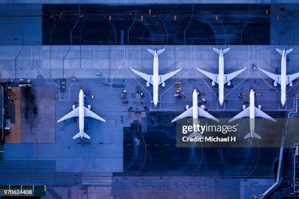 aerial view of the airport at twilight.viewpoint from directly above. - airport outside stockfoto's en -beelden