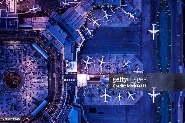 aerial view of the airport in twilight.san francisco international airport. - airport above stock-fotos und bilder