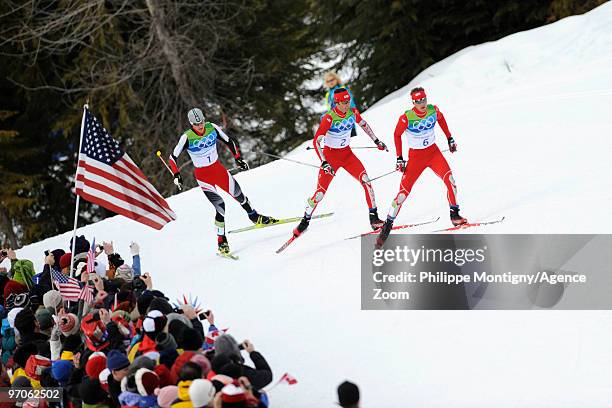 Bill Demong of the USA takes the Gold Medal, Johnny Spillane of the USA takes the Silver Medal, Bernhard Gruber of Austria takes the Bronze Medal...