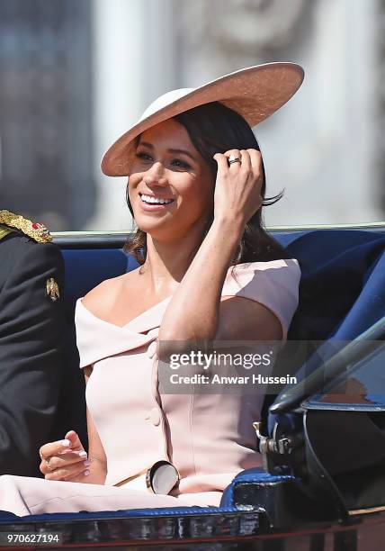 Meghan, Duchess of Sussex travel sin an open carriage to the Trooping the Colour ceremony on June 09, 2018 in London, England.