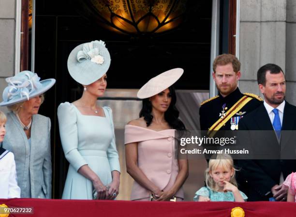 Camilla, Duchess of Cornwall. Catherine, Duchess of Cambridge, Meghan, Duchess of Sussex, Prince Harry, Duke of Sussex, Isla Phillips and Peter...