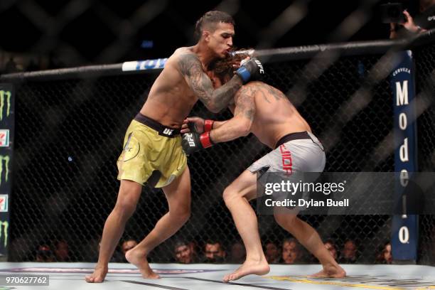 Charles Oliveira of Brazil attempts to grapple Clay Guida in the first round in their lightweight bout during the UFC 225: Whittaker v Romero 2 event...