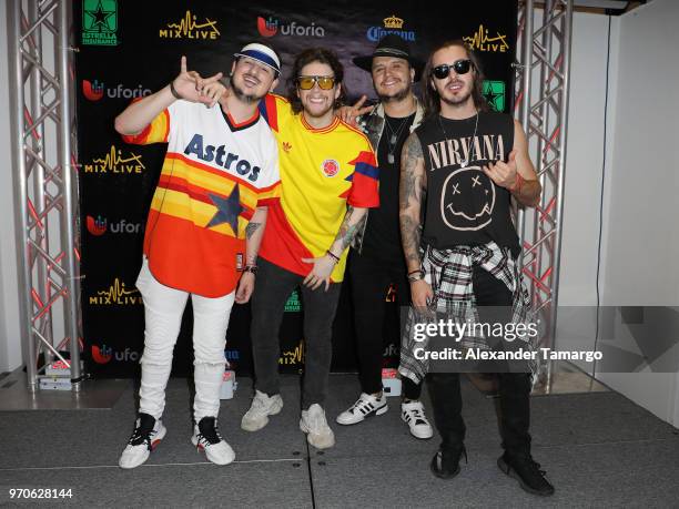 Piso 21 are seen backstage during the Mix Live! presented by Uforia concert at the AmericanAirlines Arena on June 9, 2018 in Miami, Florida.