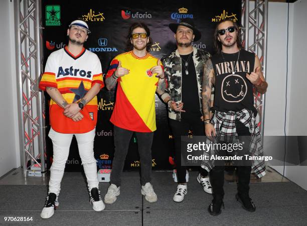 Piso 21 are seen backstage during the Mix Live! presented by Uforia concert at the AmericanAirlines Arena on June 9, 2018 in Miami, Florida.