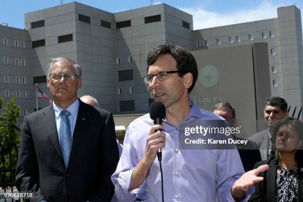 Washington state Attorney General Bob Ferguson speaks at a press conference outside the Federal Detention Center holding migrant women as Washington...