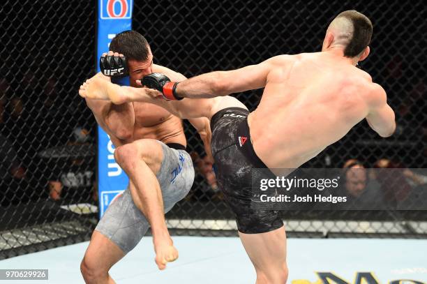 Ricardo Lamas kicks Mirsad Bektic of Bosnia in their featherweight fight during the UFC 225 event at the United Center on June 9, 2018 in Chicago,...