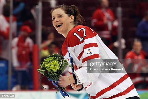 Jennifer Botterill of Canada celebrates winning the gold medal following her team's 2-0 victory during the ice hockey women's gold medal game between...