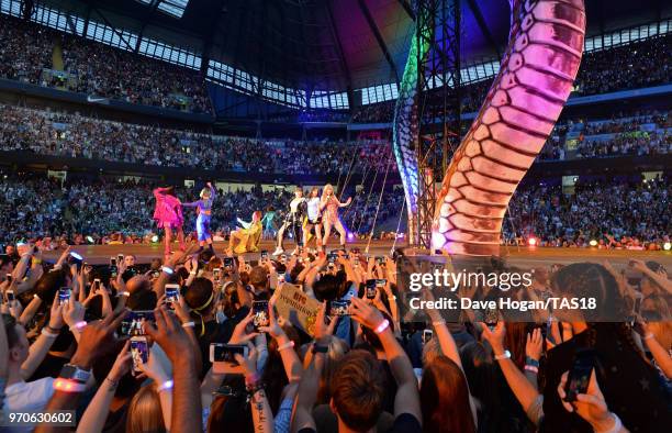 Charli XCX, Camila Cabello and Taylor Swift perform on stage during the Taylor Swift reputation Stadium Tour at Etihad Stadium on June 9, 2018 in...