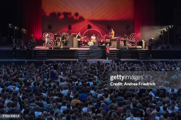 Bernd Kurtze, Torsten Scholz, Arnim Teutoburg-Weib, Thomas Gotz, Dennis Kern, and Peter Baumann of the German band Beatsteaks perform live on stage...