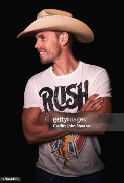 Musical artist Dustin Lynch poses in the portrait studio at the 2018 CMA Music Festival at Nissan Stadium on June 9, 2018 in Nashville, Tennessee.