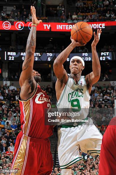 Rajon Rondo of the Boston Celtics shoots over LeBron James of the Cleveland Cavaliers on February 25, 2010 at the TD Garden in Boston, Massachusetts....