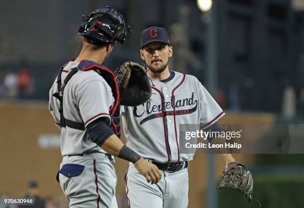 Cather Yan Gomes congratulates Dan Otero of the Cleveland Indians after the final out of the ninth inning of the game against the Detroit Tigers at...