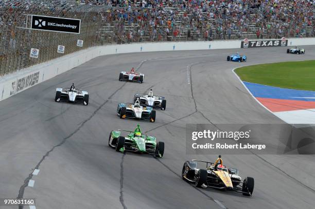 James Hinchcliffe, driver of the Arrow Electronics SPM Honda, leads a pack of cars during the Verizon IndyCar Series DXC Technology 600 at Texas...
