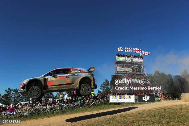 Thierry Neuville of Belgium and Nicolas Gilsoul of Belgium compete in their Hyundai Shell Mobis WRT Hyundai i20 Coupe WRC during Day Three of the WRC...