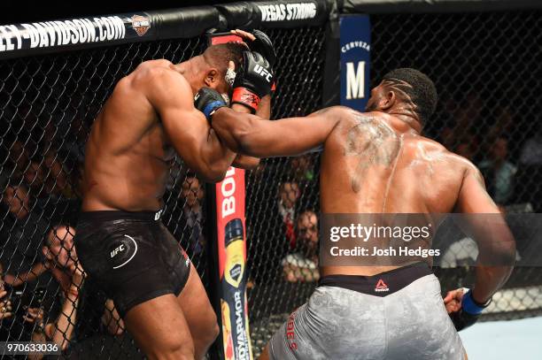 Curtis Blaydes punches Alistair Overeem in their heavyweight fight during the UFC 225 event at the United Center on June 9, 2018 in Chicago, Illinois.