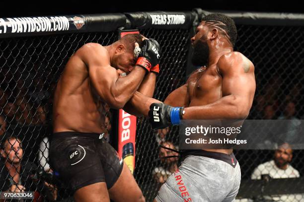 Curtis Blaydes punches Alistair Overeem in their heavyweight fight during the UFC 225 event at the United Center on June 9, 2018 in Chicago, Illinois.