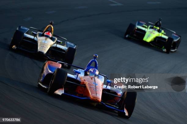 Scott Dixon, driver of the PNC Bank Chip Ganassi Racing Honda, leads a pack of cars during the Verizon IndyCar Series DXC Technology 600 at Texas...