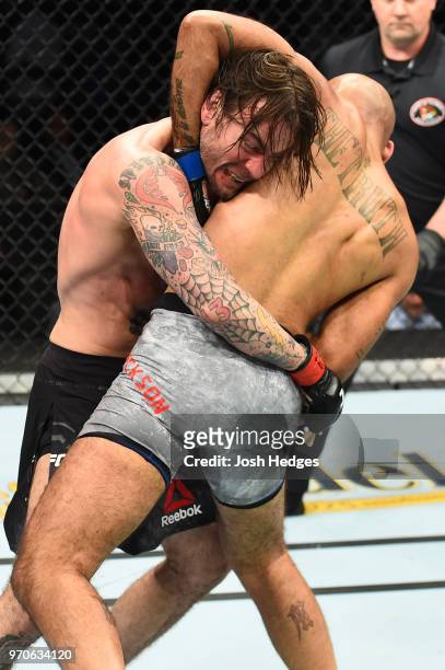 Punk attempts to take down Mike Jackson in their welterweight fight during the UFC 225 event at the United Center on June 9, 2018 in Chicago,...