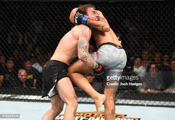 Punk attempts to take down Mike Jackson in their welterweight fight during the UFC 225 event at the United Center on June 9, 2018 in Chicago,...