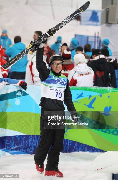Alexei Grishin of Belarus celebrates on his way to winning the gold medal during the freestyle skiing men's aerials final on day 14 of the Vancouver...