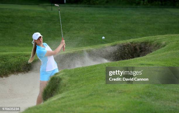 Annabell Fuller of the Great Britain and Ireland Team plays her second shot on the 10th hole in her match with India Clyburn against Kristen Gillman...