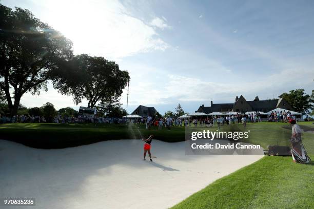 Lilia Vu of the United States Team plays her second shot on the ninth hole in her match with Jennifer Kupcho against Olivia Mehaffey and Sophie Lamb...