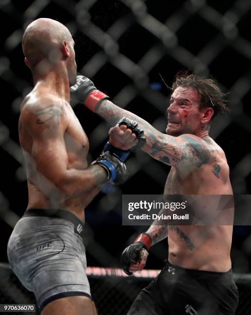 Punk misses a punch against Mike Jackson in the third round in their welterweight bout during the UFC 225: Whittaker v Romero 2 event at the United...