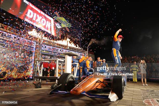 Scott Dixon, driver of the PNC Bank Chip Ganassi Racing Honda, celebrates in Victory Lane after winning the Verizon IndyCar Series DXC Technology 600...