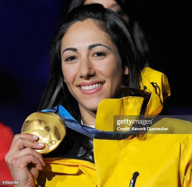 Lydia Lassila of Australia celebrates receiving the gold medal during the medal ceremony for the ladies' aerials freestyle skiing on day 14 of the...