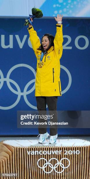 Lydia Lassila of Australia celebrates receiving the gold medal during the medal ceremony for the ladies' aerials freestyle skiing on day 14 of the...