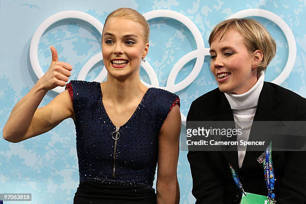 Kiira Korpi of Finland sits in the kiss and cry area with coach Susanna Haarala in the Ladies Free Skating on day 14 of the 2010 Vancouver Winter...