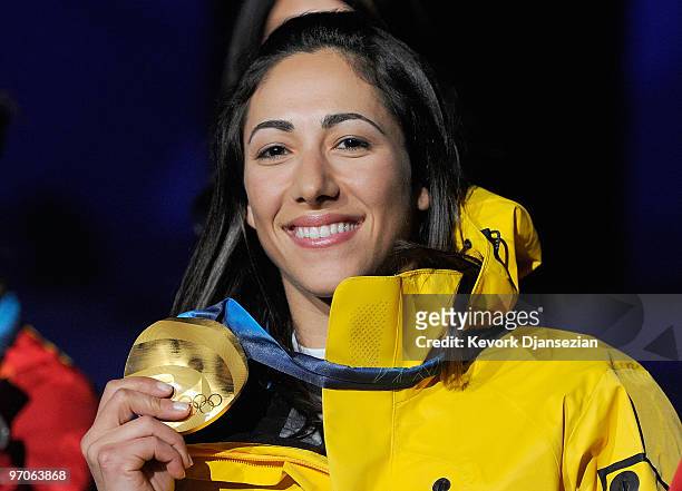 Lydia Lassila of Australia celebrates receiving the gold medal during the medal ceremony for the ladies' aerials freestyle skiing on day 14 of the...