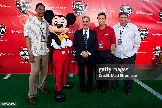 Personalities Chris Singleton, Tim Kurkjan, Karl Ravech, and John Kruk walk the red carpet with Mickey Mouse at the official relaunch of the ESPN...