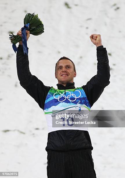 Alexei Grishin of Belarus celebrates winning the gold medal during the freestyle skiing men's aerials final on day 14 of the Vancouver 2010 Winter...