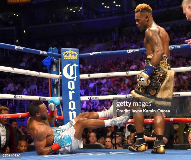 Jermell Charlo knocks down Austin Trout in their WBC Super Welterweight Title bout at Staples Center on June 9, 2018 in Los Angeles, California....