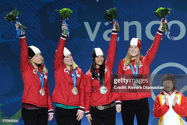 Team Canada celebrates receiving the silver medal during the medal ceremony for the ladies' 3000 m relay short track on day 14 of the Vancouver 2010...