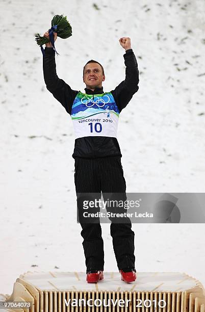 Alexei Grishin of Belarus celebrates winning the gold medal during the freestyle skiing men's aerials final on day 14 of the Vancouver 2010 Winter...
