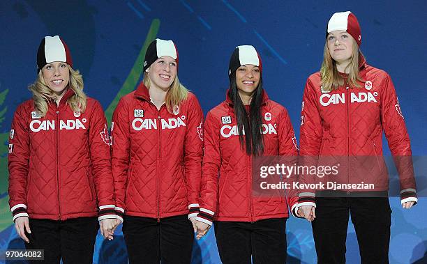 Team Canada celebrates receiving the silver medal during the medal ceremony for the ladies' 3000 m relay short track on day 14 of the Vancouver 2010...