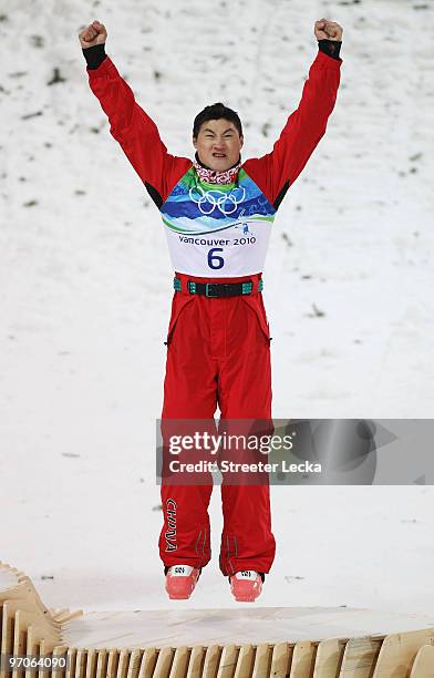 Bronze medalist Liu Zhongqing of China celebrates during the freestyle skiing men's aerials final on day 14 of the Vancouver 2010 Winter Olympics at...