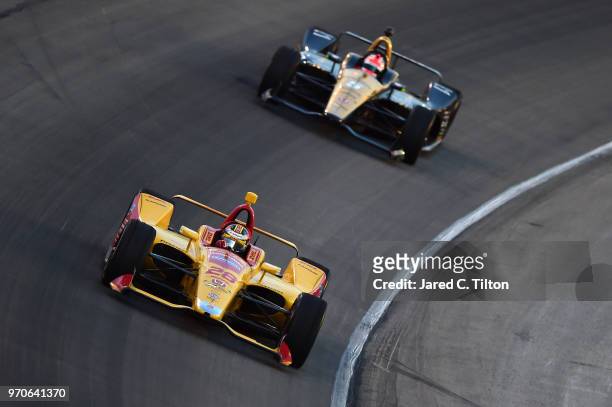 Ryan Hunter-Reay, driver of the DHL Honda, leads James Hinchcliffe, driver of the Arrow Electronics SPM Honda, during the Verizon IndyCar Series DXC...